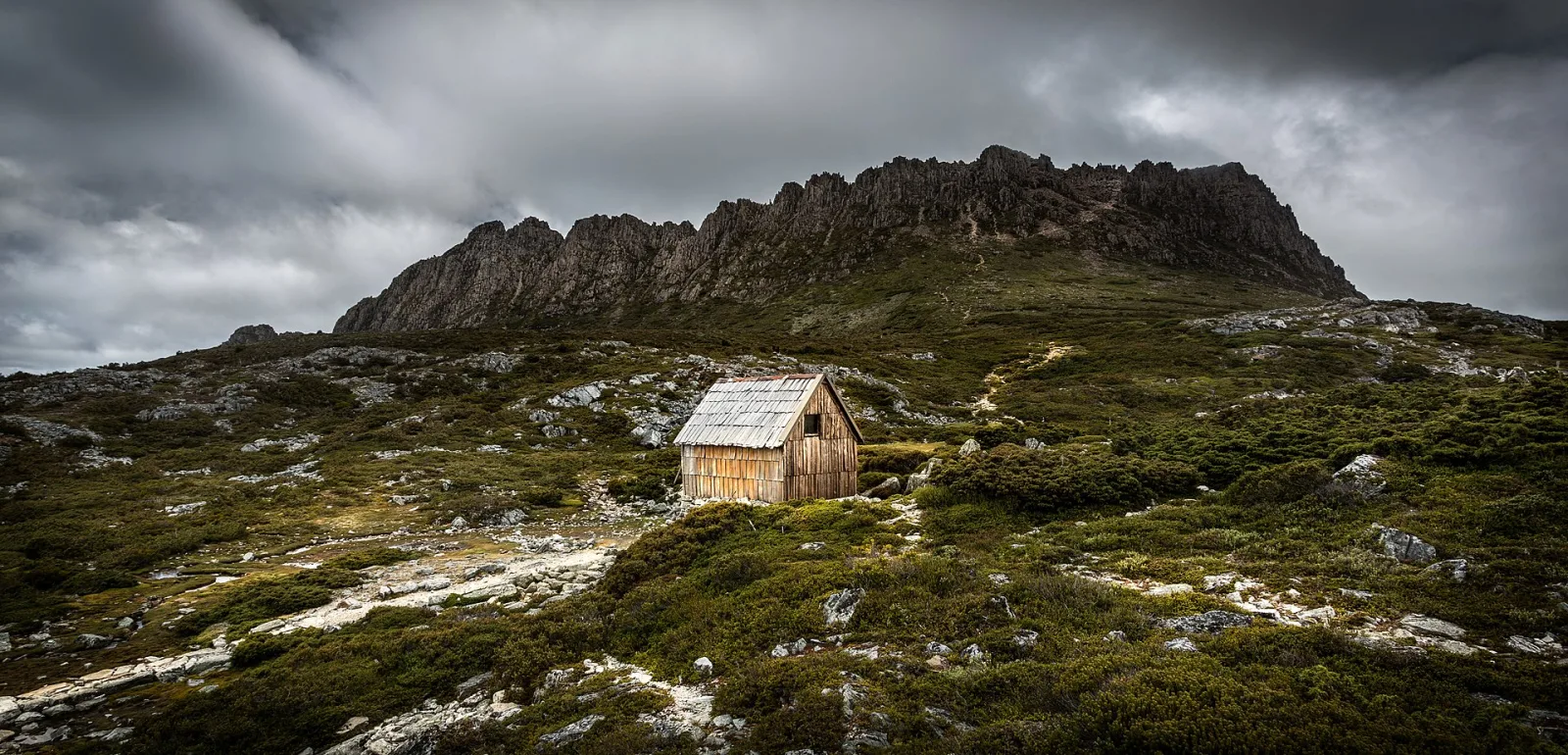 Kitchen Hut with Cradle Mountain in the background, Cradle Mountain Lake St Clair National Park.